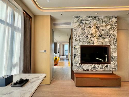 Imagen de la habitación del Hotel 南昌象湖格兰云天大酒店. Foto 18
