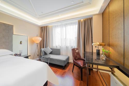 Imagen general del Hotel 锦江都城海门狮山宾馆酒店. Foto 15