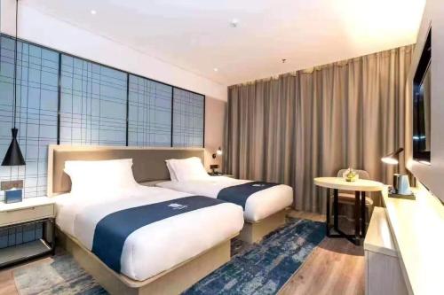 Imagen general del Hotel 宜尚酒店贺州市政广场店. Foto 3