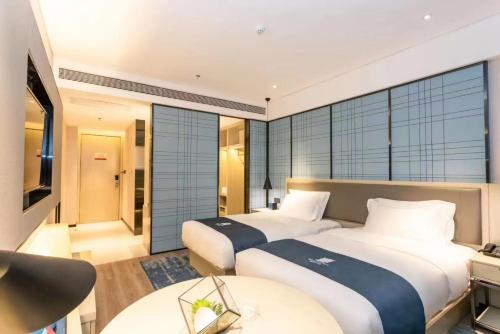 Imagen general del Hotel 宜尚酒店贺州市政广场店. Foto 4