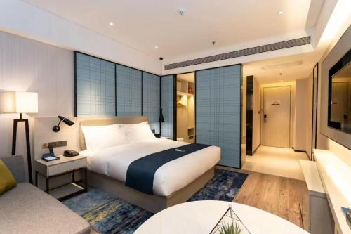 Imagen general del Hotel 宜尚酒店贺州市政广场店. Foto 5