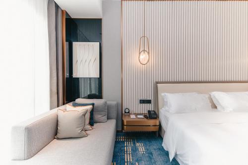 Imagen de la habitación del Hotel 湛江白天鹅酒店. Foto 12