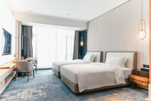 Imagen de la habitación del Hotel 湛江白天鹅酒店. Foto 19