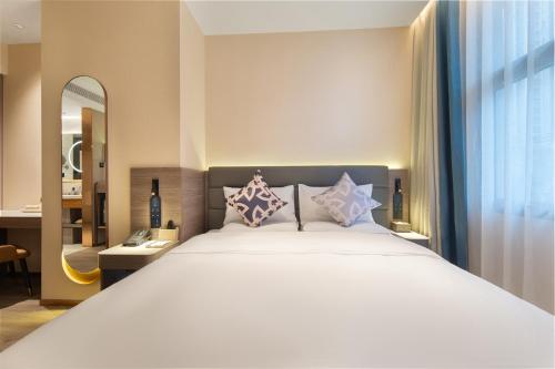 Imagen de la habitación del Hotel 朗丽兹酒店深圳罗湖口岸店. Foto 12