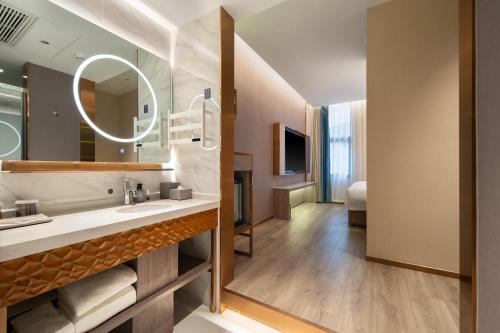 Imagen de la habitación del Hotel 朗丽兹酒店深圳罗湖口岸店. Foto 17