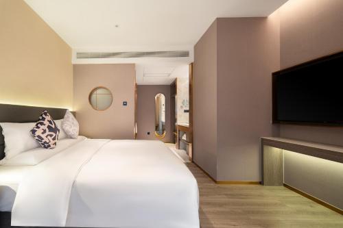 Imagen de la habitación del Hotel 朗丽兹酒店深圳罗湖口岸店. Foto 18