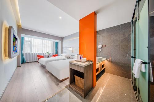 Imagen de la habitación del Hotel 丽江古城丽漫酒店. Foto 14