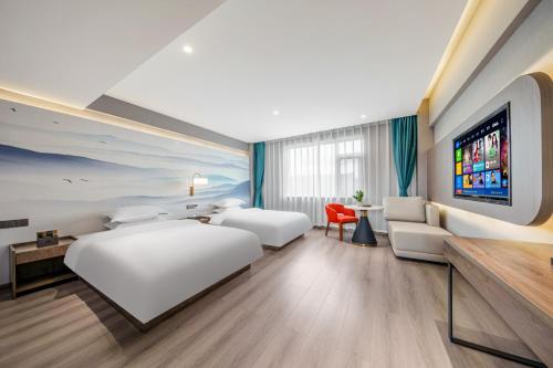 Imagen de la habitación del Hotel 丽江古城丽漫酒店. Foto 15