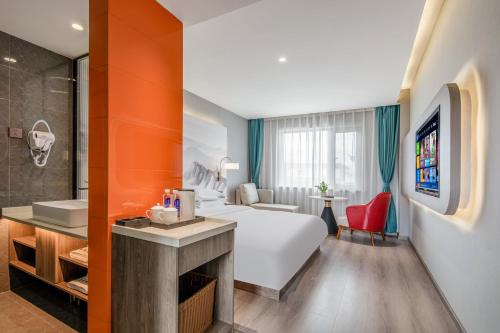 Imagen de la habitación del Hotel 丽江古城丽漫酒店. Foto 17