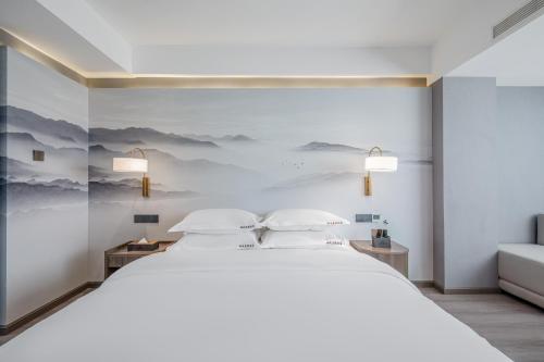 Imagen de la habitación del Hotel 丽江古城丽漫酒店. Foto 18