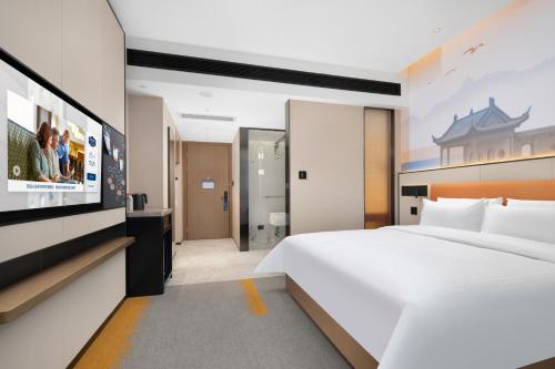 Imagen de la habitación del Hotel 九江长虹大道希尔顿欢朋酒店. Foto 14