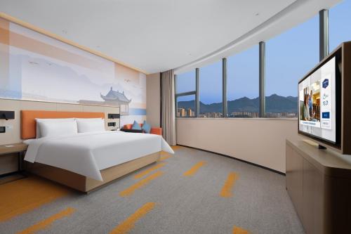 Imagen de la habitación del Hotel 九江长虹大道希尔顿欢朋酒店. Foto 15