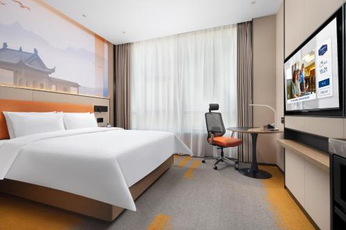 Imagen de la habitación del Hotel 九江长虹大道希尔顿欢朋酒店. Foto 16