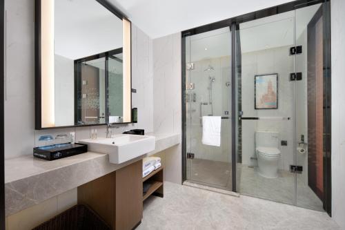 Imagen de la habitación del Hotel 九江长虹大道希尔顿欢朋酒店. Foto 17