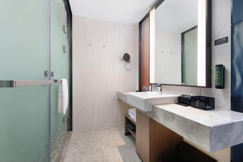 Imagen de la habitación del Hotel 九江长虹大道希尔顿欢朋酒店. Foto 18