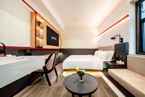Imagen de la habitación del Hotel 厦门中山路步行街趣栗酒店. Foto 13