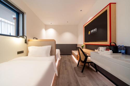 Imagen de la habitación del Hotel 厦门中山路步行街趣栗酒店. Foto 14