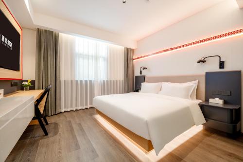 Imagen de la habitación del Hotel 厦门中山路步行街趣栗酒店. Foto 16