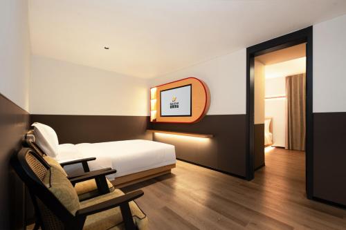 Imagen de la habitación del Hotel 厦门中山路步行街趣栗酒店. Foto 20