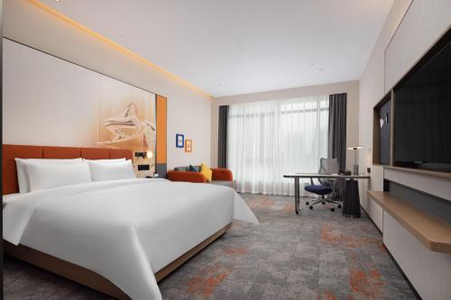 Imagen de la habitación del Hotel 广州新塘高铁站希尔顿欢朋酒店. Foto 20