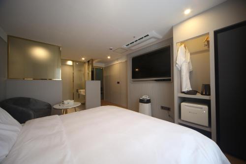 Imagen de la habitación del Hotel 동래 덴바스타 호텔. Foto 17