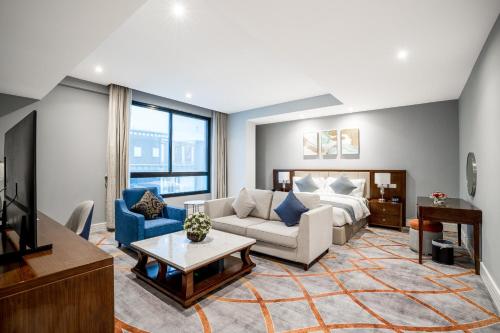 Imagen de la habitación del Hotel فندق شراعوه الملكي. Foto 11