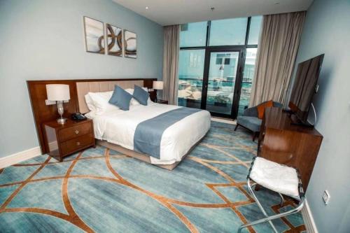 Imagen de la habitación del Hotel فندق شراعوه الملكي. Foto 14