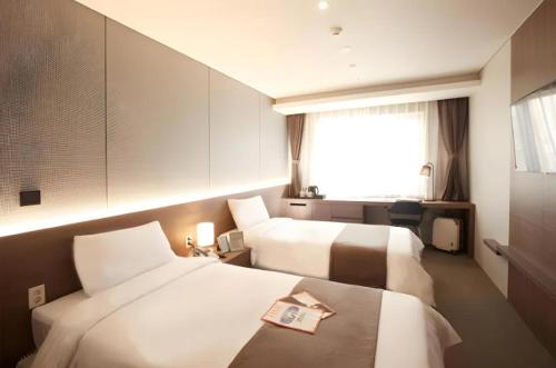 Imagen de la habitación del Hotel 호텔 엘로라. Foto 19