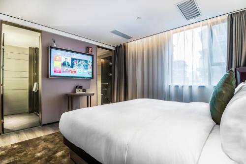 Imagen de la habitación del Hotel 广州北京路步行街酒店. Foto 17