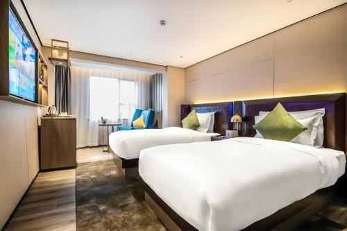 Imagen de la habitación del Hotel 广州北京路步行街酒店. Foto 18