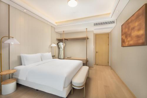 Imagen general del Hotel 苏州山塘街华贸姑苏里服务公寓. Foto 9
