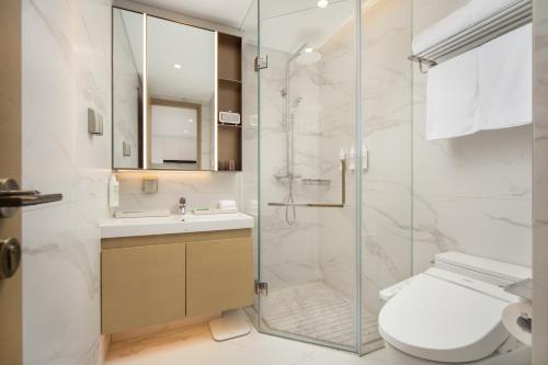 Imagen general del Hotel 苏州山塘街华贸姑苏里服务公寓. Foto 12