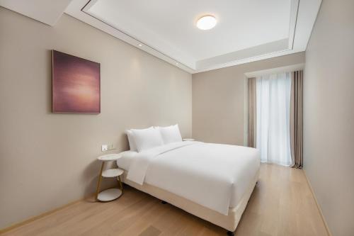 Imagen general del Hotel 苏州山塘街华贸姑苏里服务公寓. Foto 13