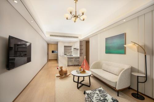 Imagen de la habitación del Hotel 苏州山塘街华贸姑苏里服务公寓. Foto 17