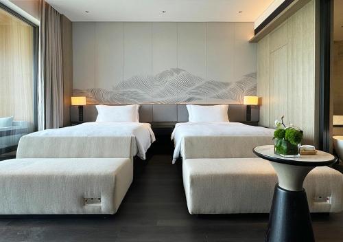 Imagen de la habitación del Hotel 北戴河英迪格酒店. Foto 15