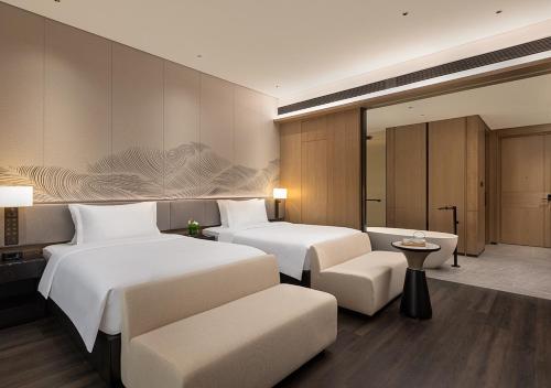Imagen de la habitación del Hotel 北戴河英迪格酒店. Foto 17