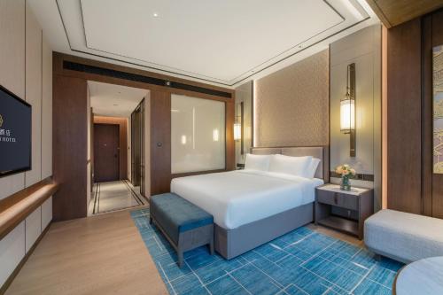 Imagen de la habitación del Hotel 佛山源林酒店. Foto 12