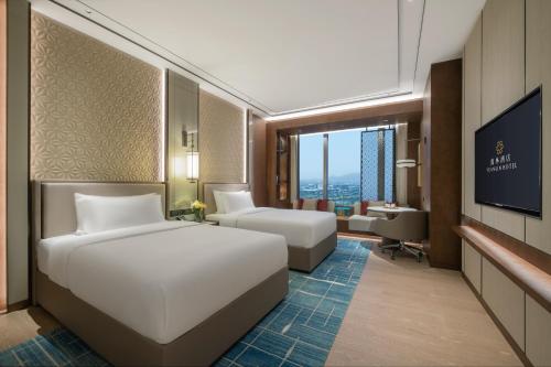 Imagen de la habitación del Hotel 佛山源林酒店. Foto 13