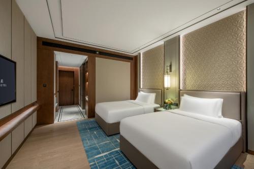 Imagen de la habitación del Hotel 佛山源林酒店. Foto 14