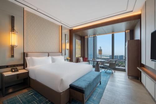 Imagen de la habitación del Hotel 佛山源林酒店. Foto 17