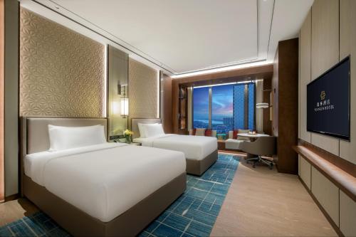 Imagen de la habitación del Hotel 佛山源林酒店. Foto 19