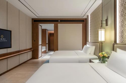 Imagen de la habitación del Hotel 佛山源林酒店. Foto 20