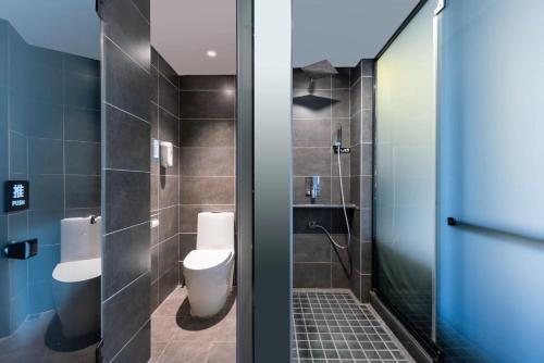 Imagen de la habitación del Hotel 时光漫步酒店（太原理工大学下元店）. Foto 15