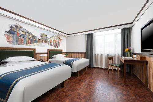 Imagen general del Hotel 时光漫步酒店（太原理工大学下元店）. Foto 7