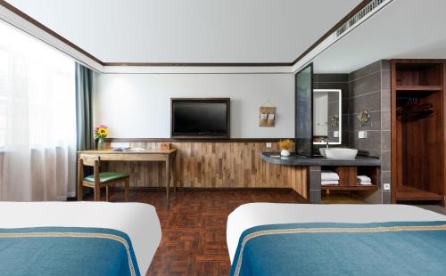 Imagen general del Hotel 时光漫步酒店（太原理工大学下元店）. Foto 8