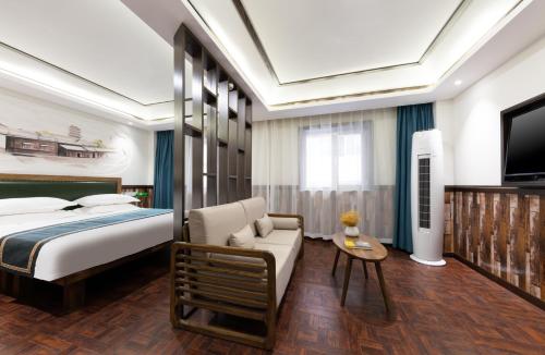 Imagen de la habitación del Hotel 时光漫步酒店（太原理工大学下元店）. Foto 17