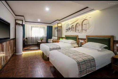 Imagen de la habitación del Hotel 时光漫步酒店（太原理工大学下元店）. Foto 20