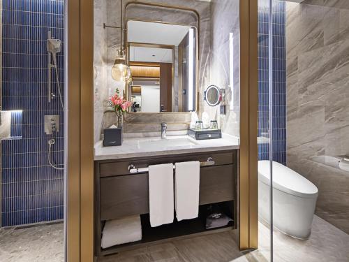 Imagen de la habitación del Hotel 上海虹桥兖矿郁锦香酒店. Foto 13