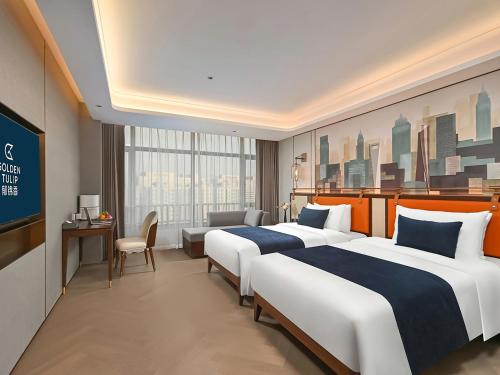 Imagen de la habitación del Hotel 上海虹桥兖矿郁锦香酒店. Foto 16