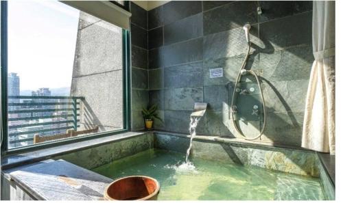 Imagen de la habitación del Hotel 礁溪溜溜溫泉民宿. Foto 11